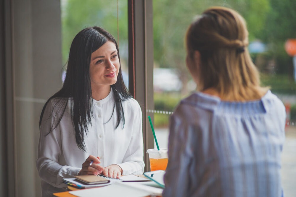 Therapist and client talking during session